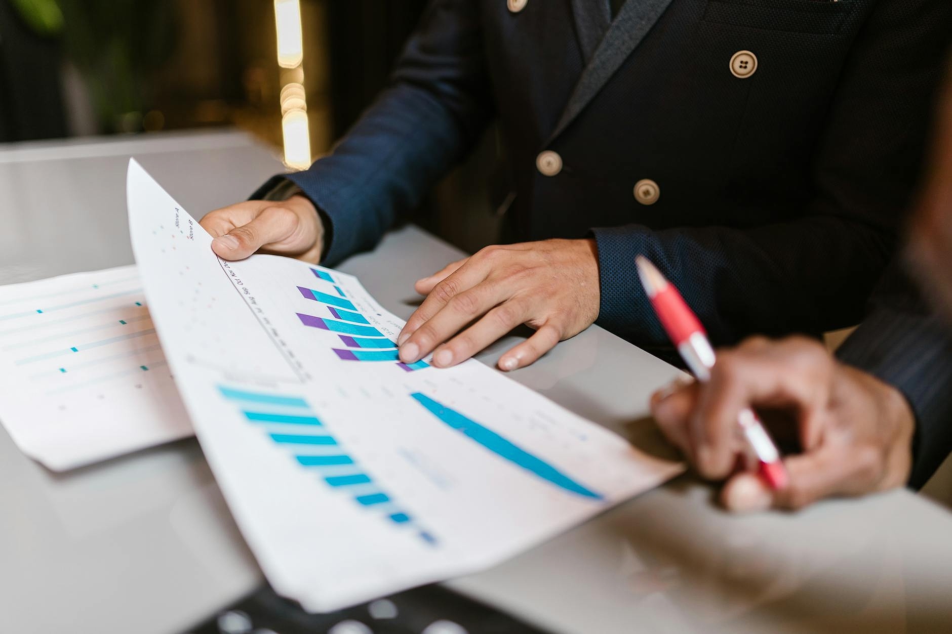 Finance team reviewing accounts payable process map in Luxembourg office
